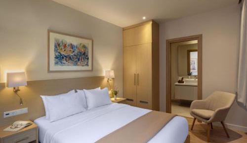 Superior Room with with City & Side Port View
