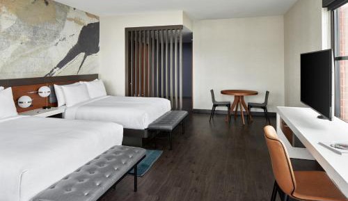 Deluxe Corner Queen Room with Two Queen Beds