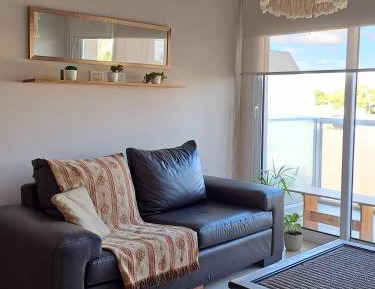 One-Bedroom Apartment with Balcony and City View