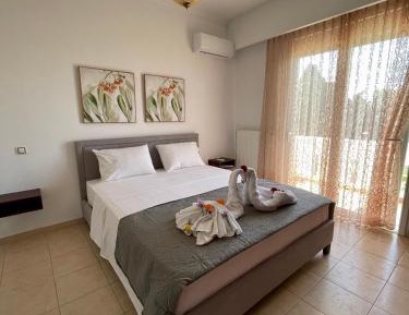 One-Bedroom Apartment with Balcony and City View