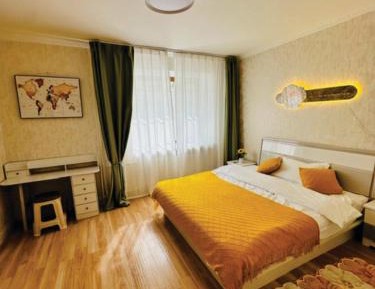 Three-Bedroom Apartment with Balcony
