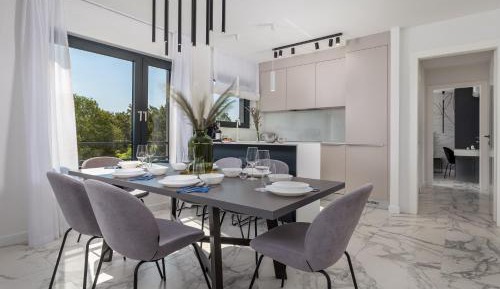 Three-Bedroom Apartment with Sea View