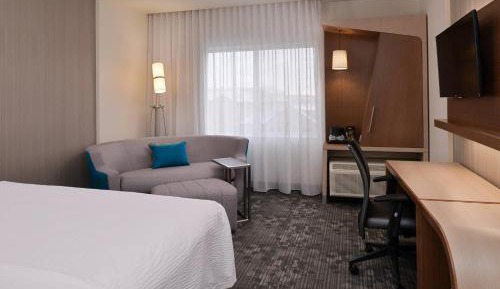 King Room with Sofa Bed and Roll-in Shower - Mobility and Hearing Accessible