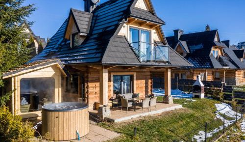 Two-Bedroom Chalet DREAM 1 with jacuzzi and sauna