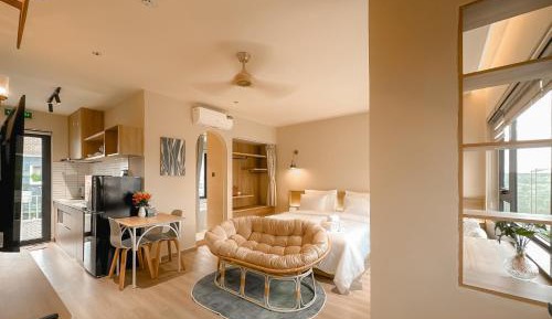One-Bedroom Apartment with Balcony and City View