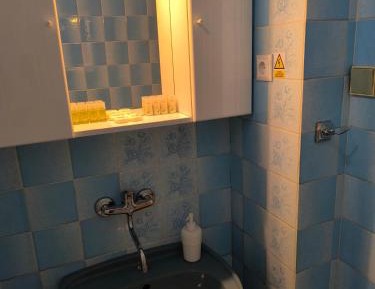 Quadruple Room with Private Bathroom