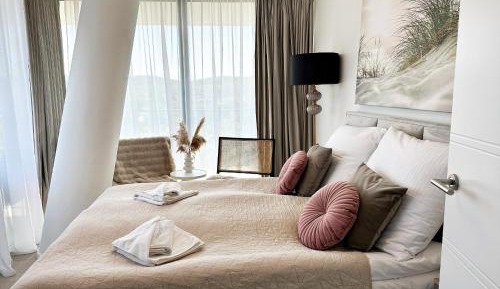 One-Bedroom Apartment with Balcony and Sea View