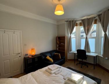 Queen Room with Shared Bathroom