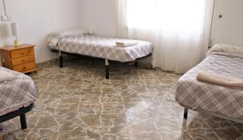 Triple Room with Shared Bathroom