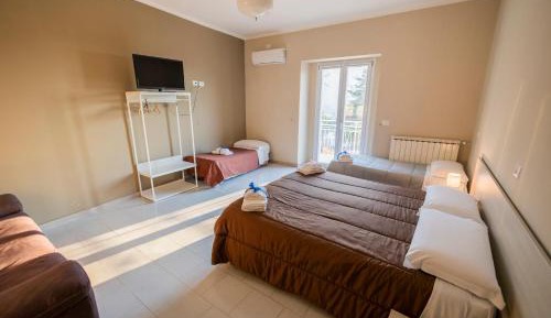 Deluxe Quadruple Room with Balcony