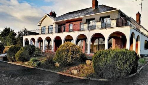 Six-Bedroom House