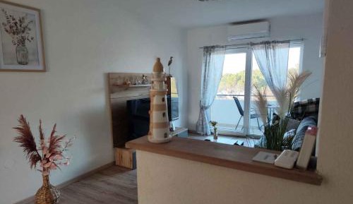 Two-Bedroom Apartment with Balcony and Sea View