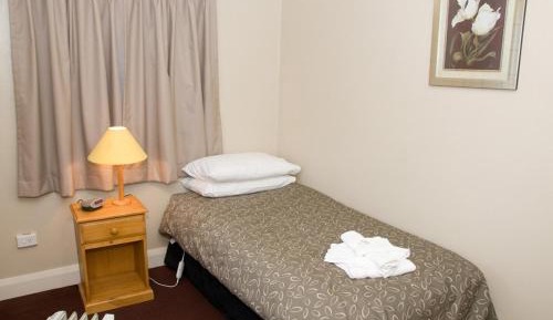 Single Room with Shared Shower and Toilet