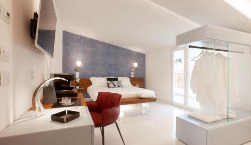 Quadruple Suite with Balcony and Sea Side View