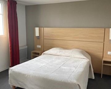 Two-Bedroom Apartment with Balcony