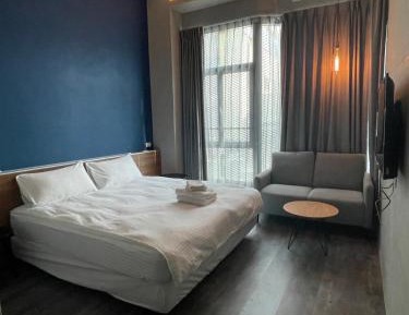 Quadruple Room with Private Bathroom