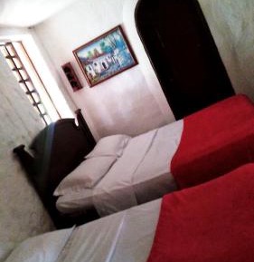 Economy Quadruple Room with Shared Bathroom