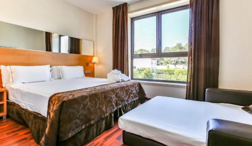 Quadruple Room (2 Adults + 2 Children)