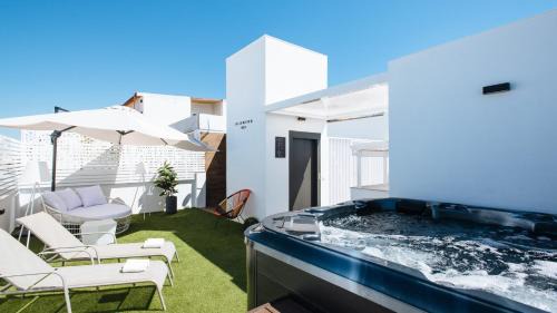 Apartamento 2 dormitorios con Jacuzzi compartido en terraza común
