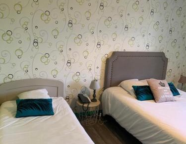 Triple Room (2 Adults + 1 Child)