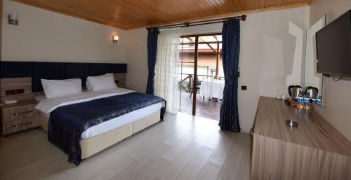 Standard Double Room with Private Patio & Side Sea View - Annex Building