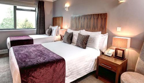 Large Room with One Double and One Single Bed
