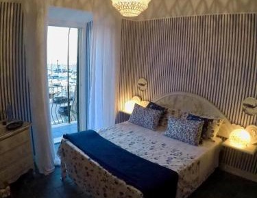 Quadruple Room with Shared Bathroom