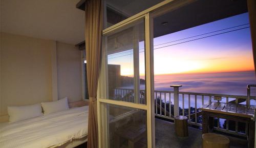 Deluxe Quadruple Room with Balcony Night View