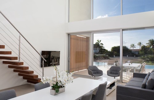 Belnem Villa | CARAIBAS fully air-conditioned vacation design villa with 20m lap pool