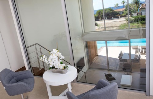 Belnem Villa | CARAIBAS fully air-conditioned vacation design villa with 20m lap pool