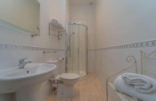 Livingston Cabin | This spacious twin room, located on the first floor, boasts relaxing neutral decor,