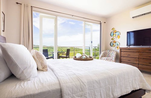Aguada Apartment | Rincon View Suites 04 with infinity pools & mountain views!