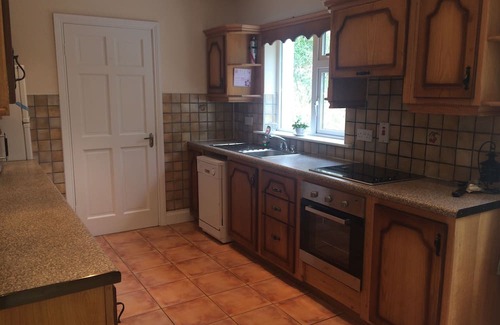 Kenmare Condo | 3 bedroom home to sleep 7 with stunning views of the Sheen River and Falls