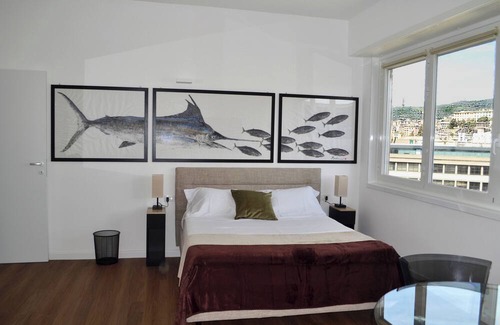Castelletto Apartment | Central penthouse with balcony and city view