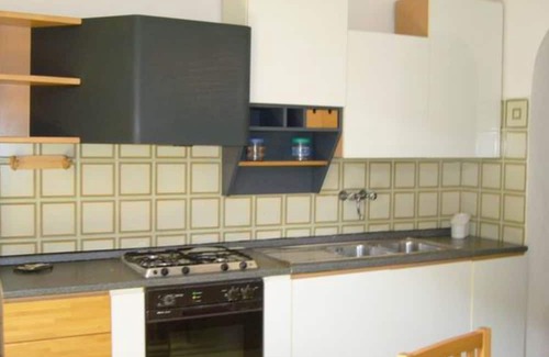 Giannella House | Holiday Home 'Residence Giannella - Pitosforo 46' with Private Garden and Air Conditioning