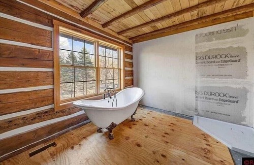 Kasota House | 130 Year Old Log Barn Transformed Into A New Home.