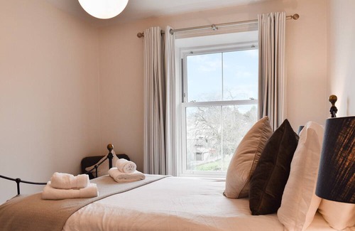 Arnside Cottage | Belmont Apartment seamlessly combines modern comfort with timeless charm, providing a tranquil sanct