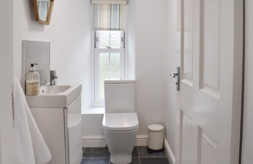 Arnside Cottage | Belmont Apartment seamlessly combines modern comfort with timeless charm, providing a tranquil sanct