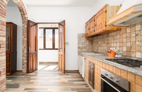 Irgoli Apartment | Apartment 'Casa Vacanza Nel Centro Di Irgoli' with Private Terrace, Wi-Fi and Air Conditioning