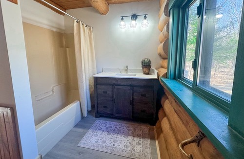 Pine County Cabin | Cozy log cabin located on a peaceful river near ATV trails and historic Duluth