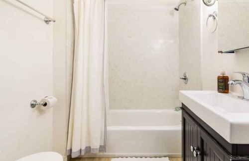 Ralph Bunche Apartment | Zen Room & Private Deck in Stunning Victorian