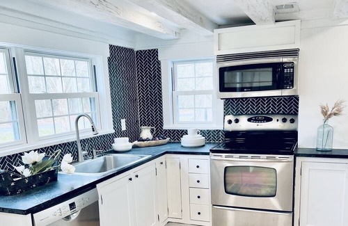 Hamilton House | Historic gem in the heart of downtown Hamilton! Trees and a private stream