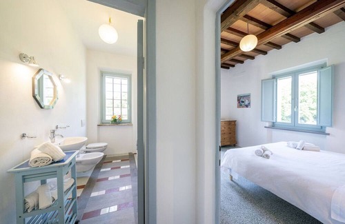 Vernazzano Basso Villa | Lovely apartment in villa with pool, WIFI, TV, patio, pets allowed and parking, close to Cortona