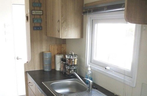 Selsey House | A small comfortable caravan, in a quiet location, with a lovely outside area to relax