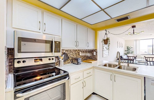 Palma del Mar Condo | Bay & golf course-view condo with pool, spa, fishing pier, & private balcony