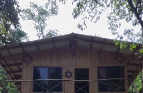 Rio Seco Cabin | Rustic Costa Rica experience. wooden house in the trees.