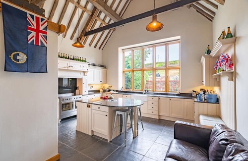 Salthouse House | Salty Bottom is a stunning barn conversion in the heart of the super popular coastal village of Salt