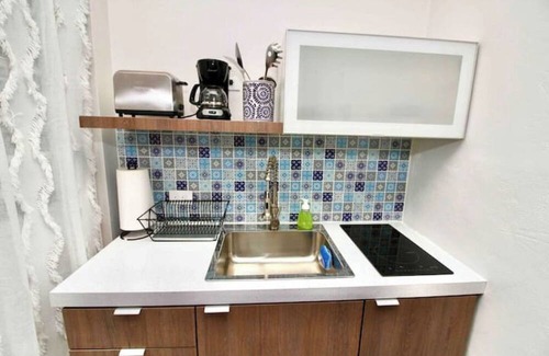 Mayaguez Pueblo Apartment | 1.4 Bohemian Hipster Living with Generator