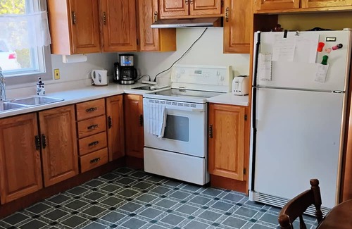 Deer Lake House | Ski, Snowmobile, hike, golf or rest and relax at the cross roads of Newfoundland