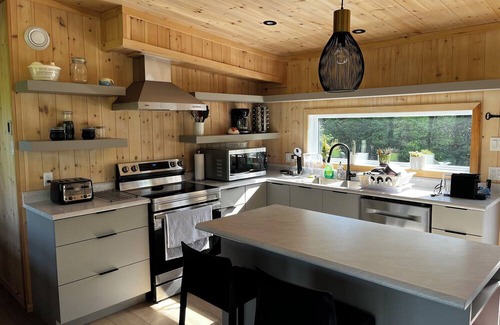 Saint-Calixte Ski Chalet | Escape to nature: chalet with spa, hiking, and lake access!